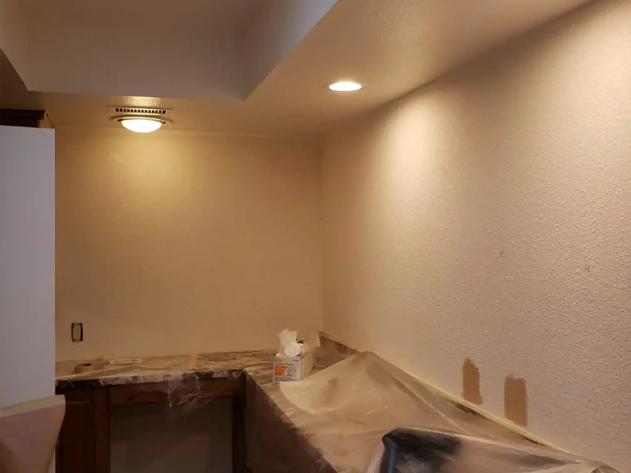 Interior walls prepared and painted with warm neutral colour